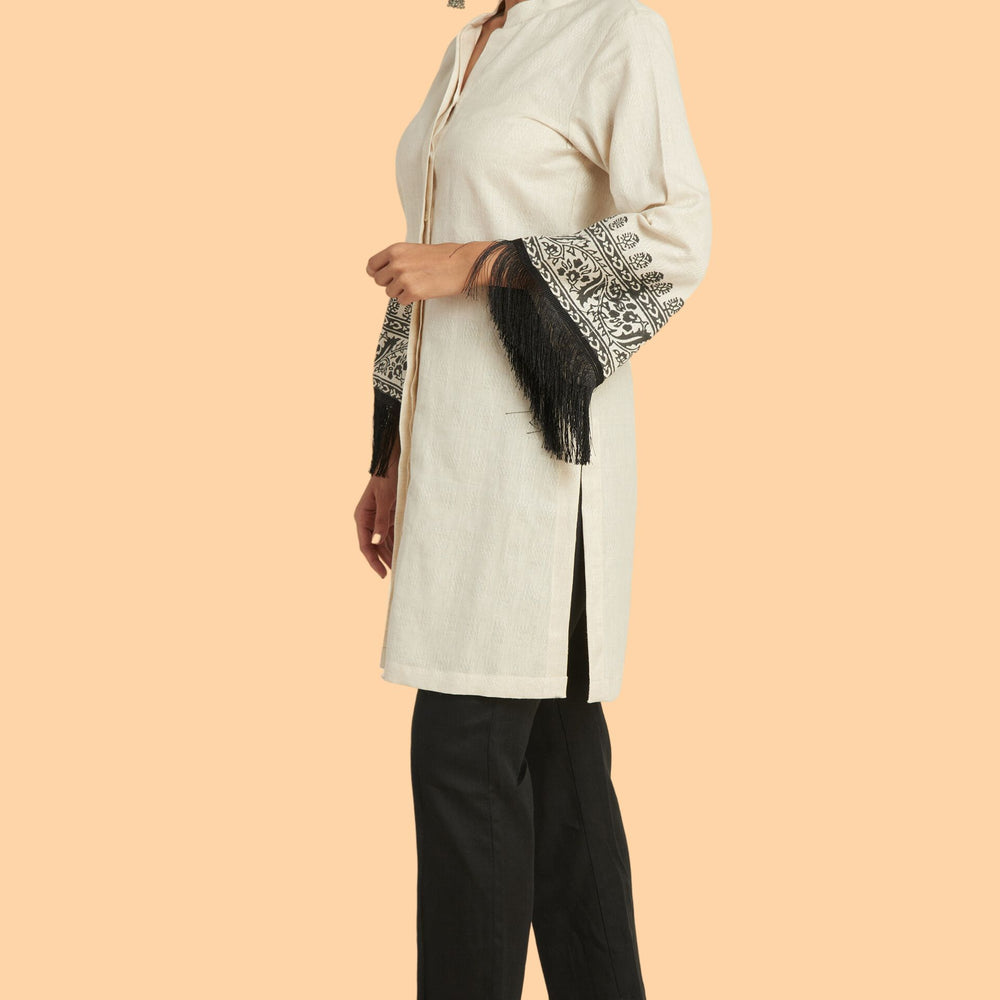 
                      
                        Short Kurti Top With Hand Block Printed Bell Sleeves Bordered by Fringe Lace
                      
                    