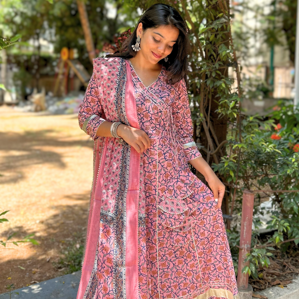 
                      
                        Floral Hand-Printed Pink Angarkha Suit Set in Pure Cotton with Gota Pati Details
                      
                    