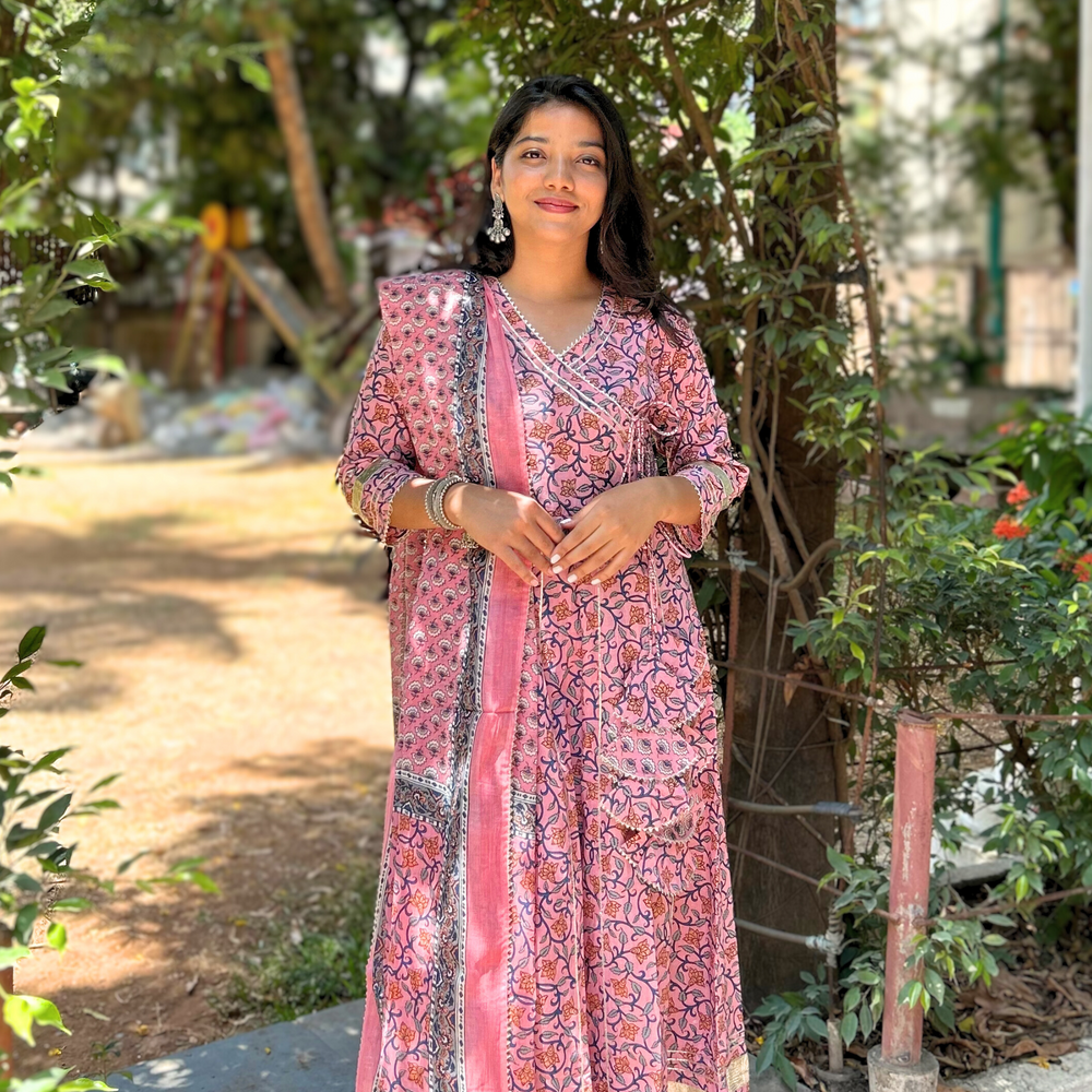 
                      
                        Floral Hand-Printed Pink Angarkha Suit Set in Pure Cotton with Gota Pati Details
                      
                    