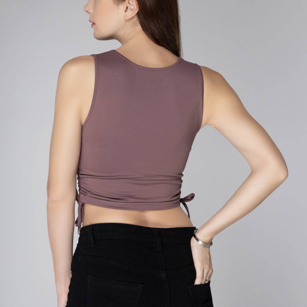 
                      
                        Women Solid Waist Tie-up Crop Top
                      
                    