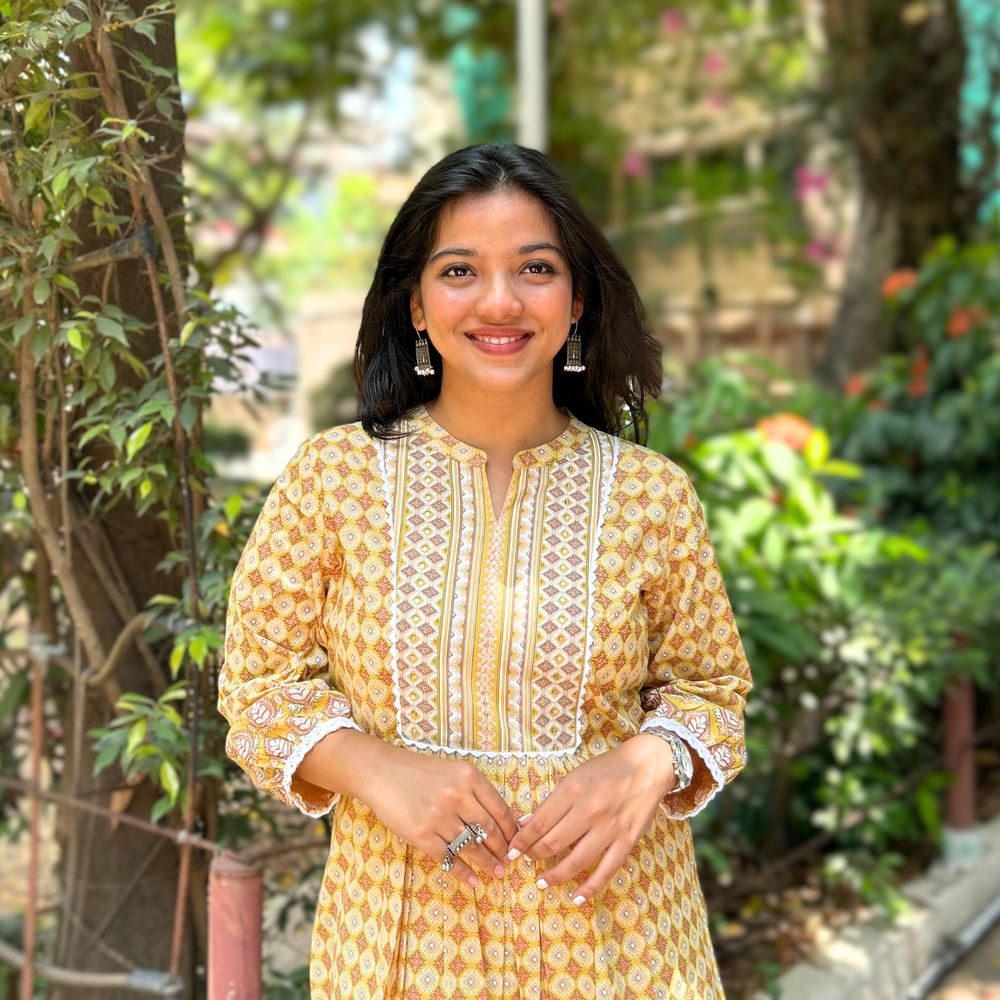 
                      
                        Yellow Geometric Hand-Printed Pure Cotton Kurti with Sequence Embroidery
                      
                    