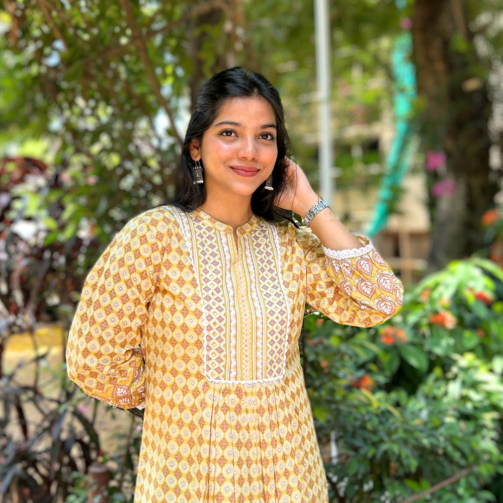 
                      
                        Yellow Geometric Hand-Printed Pure Cotton Kurti with Sequence Embroidery
                      
                    