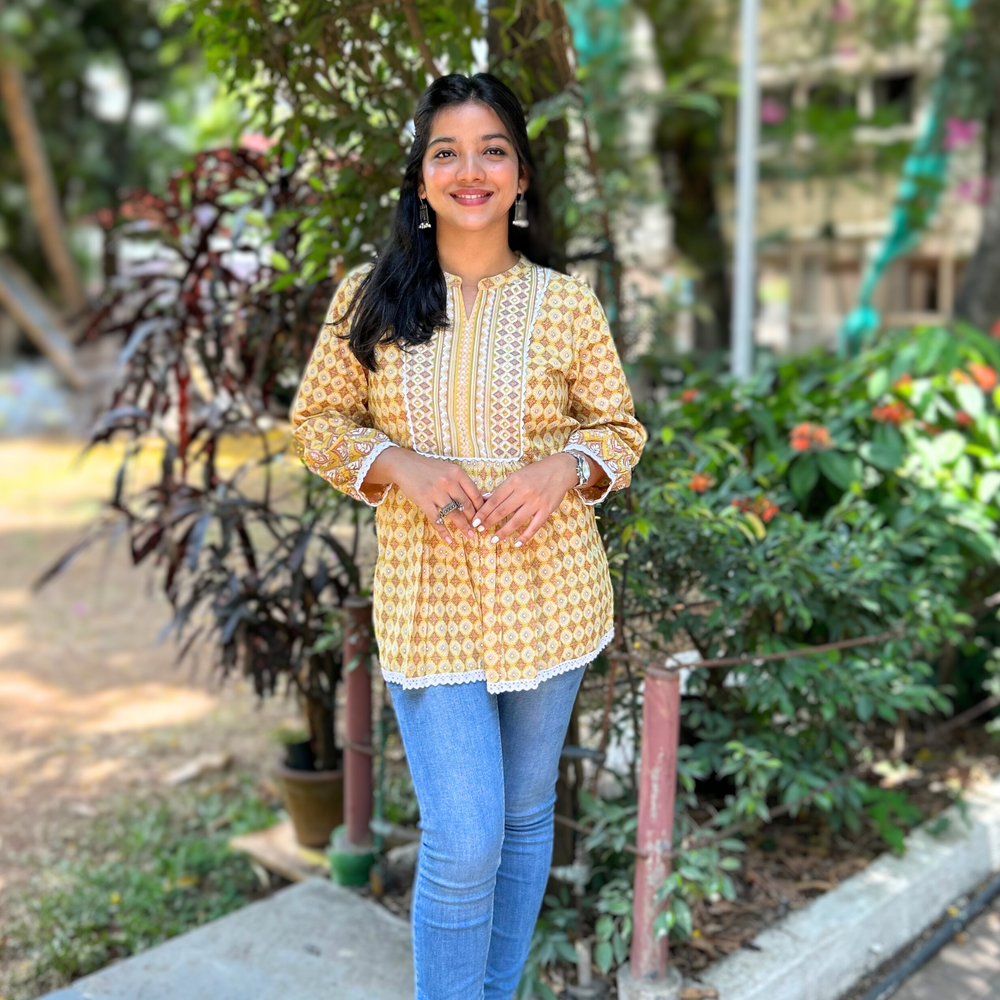 
                      
                        Yellow Geometric Hand-Printed Pure Cotton Kurti with Sequence Embroidery
                      
                    
